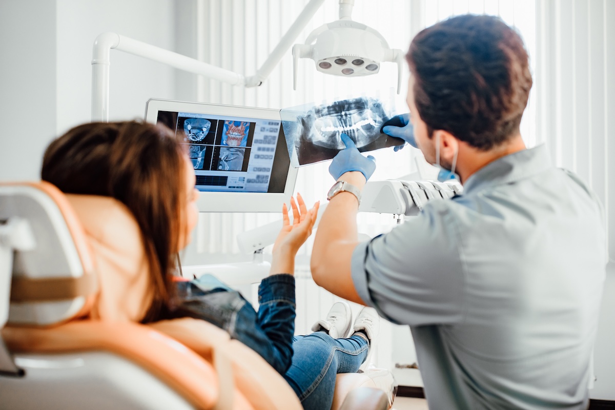 dentist pointing at xray